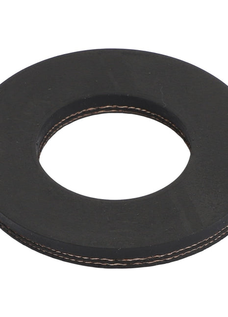 The AGCO SPACER - AG109948 is a round, black rubber gasket with a hole in the center, commonly used for sealing or cushioning in mechanical applications.