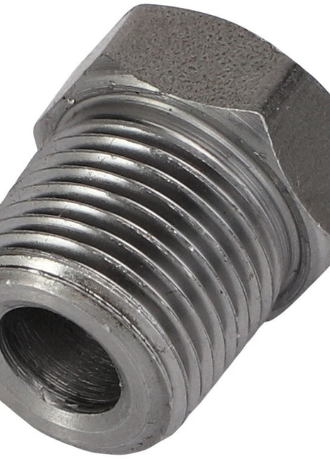 Close-up of the AGCO BUSH - AG714863 metallic threaded pipe fitting, showcasing its cylindrical shape, distinctive ridges, and hexagonal head designed for use with a wrench.