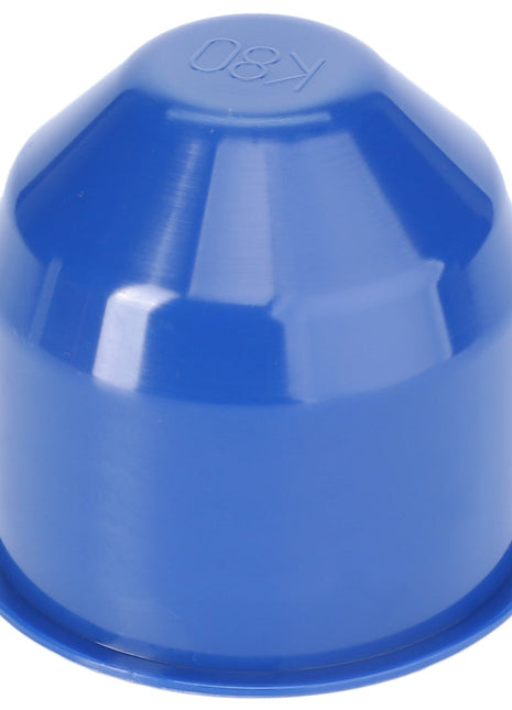 A blue plastic retainer cap with a slightly domed top and the marking "K80" embossed on its surface, designed to fit securely into linkage components, from AGCO.