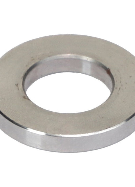 The AGCO | Sleeve - V836328922 by AGCO is a metallic washer featuring a circular hole in the center, designed to distribute load or prevent damage from screw or bolt heads. No current product description available.