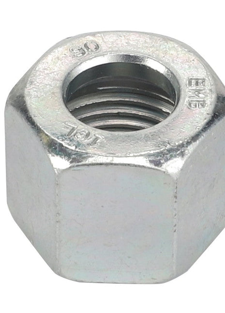 Close-up image of the AGCO | UNION - D46446000 hexagonal metal nut, showcasing visible threading inside and intricate markings etched on the flat outer surface.