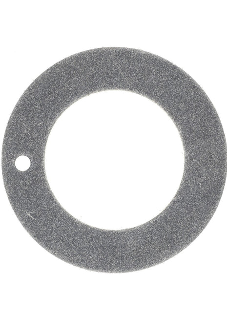 A top-down view of the AGCO Washer - Acw9109030, a gray circular gasket featuring a small hole near its outer edge. No current product description information is available regarding materials or specifications.