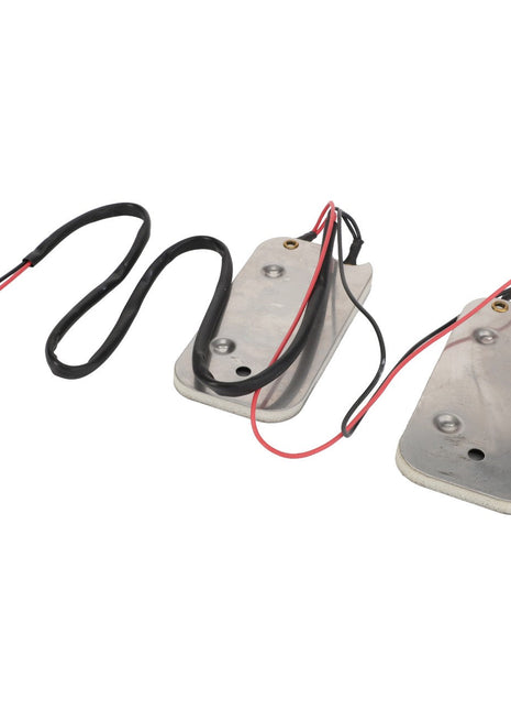 Two rectangular metal heating pads, equipped with attached black and red wires and connectors, are arranged on a white background. This specific product is the AGCO Sensor - Acp0523880 from the AGCO brand; however, no further current product description is available for this item.