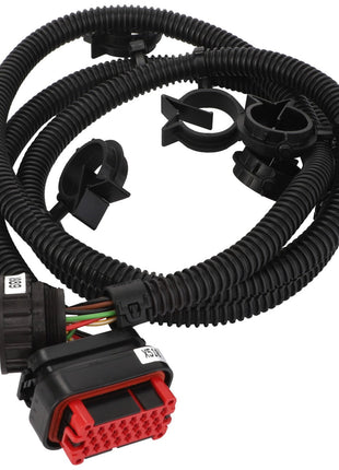 The AGCO | Harness - Acw3526760 is a coiled black electrical wiring harness featuring multiple connectors and colored wires, including a prominent large red connector at one end. Currently, no additional product description information is available.