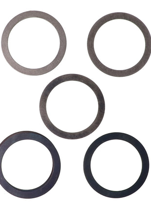 Using five circular metal washers from the AGCO Shim Kit - Acp0360610, the arrangement is in the shape of a plus sign.