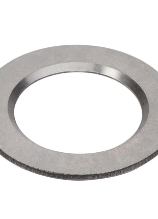 A close-up of the AGCO Disc - F339300020470, a silver metal washer with a central hole, lying flat on a white background.