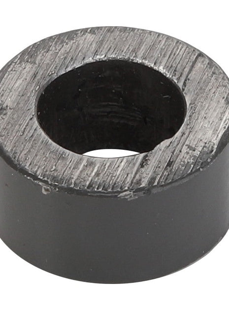 The product image shows an AGCO | SPACER - AG120463, which is a black metal cylindrical spacer featuring a central hole, set against a white background. At present, there is no available product description information for this item.