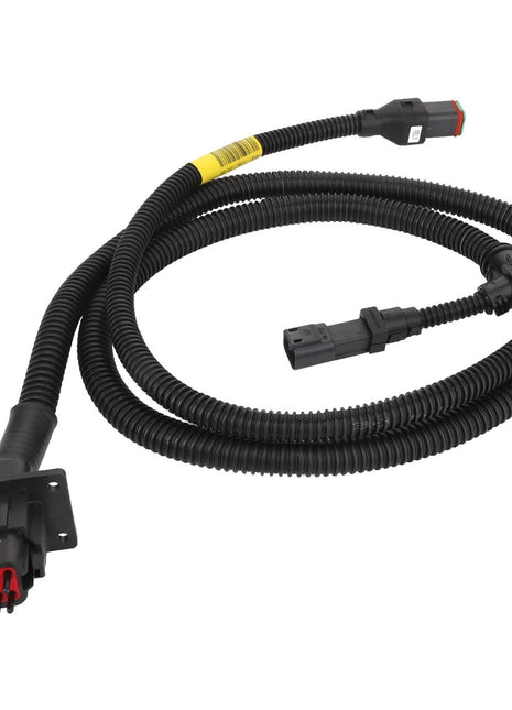 Introducing the AGCO Harness - Acw106479A, a coiled wiring harness with connectors at both ends, perfect for automotive or electronic applications. No current product description information is available regarding its specifications.