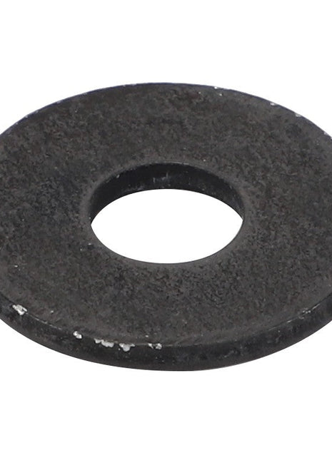 The AGCO | Flat Washer - Acw6056450 is a sleek, circular black metal washer featuring a central hole.