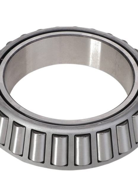 A cylindrical roller bearing, known as the AGCO | BEARING CONE - AG520699 from the AGCO brand, features a metal outer ring and evenly spaced rollers inside, designed to handle both radial loads and some thrust loads.