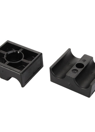 The AGCO | Clamp - Acx0133180 consists of two black plastic mounts designed for holding and securing cylindrical objects, displayed in different orientations. The left mount features a circular holder, while the right has a semi-circular groove. No current product description information is available from AGCO.