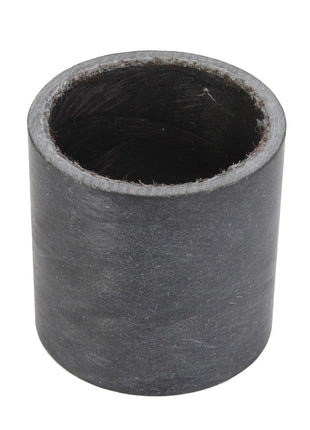 The AGCO Bush - Acw1125770 is a cylindrical, black rubber bushing with a hollow center, presented from an angle that highlights its circular opening.