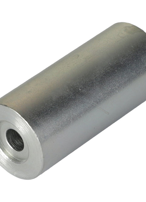 The AGCO | Spacer - Acw0694310 is a cylindrical metallic spacer featuring a central threaded hole. No current product description information is available.