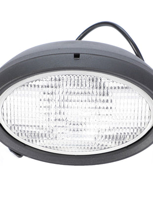 Introducing the AGCO Work Light, model 4384409M1, an oval-shaped LED light featuring a ribbed clear lens housed in a sleek black casing. It includes two mounting screws and a black cable extending from the back. This front work light comes equipped with an H3 12V 55W bulb and is ideal for use as genuine AGCO work lights on Massey Ferguson or Valtra models.