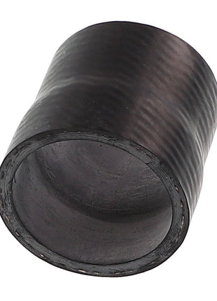 The AGCO HOSE - ACP0581580 is a cylindrical black plastic pipe connector featuring visible textures on the outer surface. According to the product description, it is hollow and slightly tapered at one end. For any ordering inquiries, please reach out to our support team.