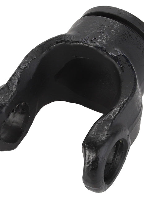 The AGCO | YOKE - D45634400 by AGCO is a black, cylindrical metal component with a U-shaped fork on one end, featuring some wear and a rough surface texture. Currently, no product description information is available.