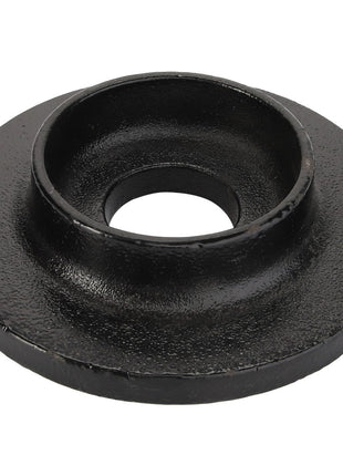 The AGCO Cap - Acp0017430 is a black metal flange featuring a central hole and a raised inner ring. Currently, no specific product description is available for this item.