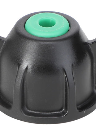 Black plastic cap with four ridged protrusions and a green circular insert in the center, compatible with Pentair Hypro Replacement Check Valve featuring Viton seals. Officially named AGCO | NOZZLE CAP - AG334231 by the brand AGCO.