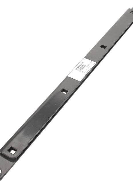 A long, rectangular metal bracket named "Clamp - Acw1696270" by AGCO features a hole at each end and several square cutouts along its length. In the center, there is a white product label with a barcode and some printed text. Please note: No current product description information is available beyond this label.