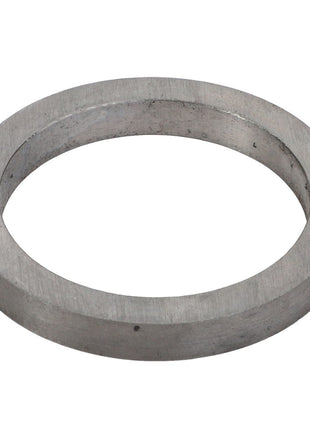 Viewed from an angle, the AGCO | INTERMEDIATE RING - V30386300 is a metallic washer ring with a circular shape and a central hole.
