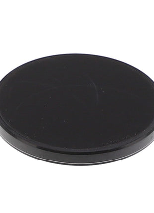 A round, flat, black AGCO | Seal Cap - Acp0287180 is set against a stark white background. No current product description available.