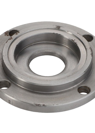 The AGCO BEARING CAP - ACY1203090 is a metal flange featuring a central hole and three evenly spaced smaller holes around the perimeter. It is typically utilized for mechanical or engineering applications. No further product description information is available at this time.