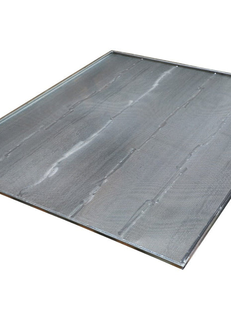 The AGCO Sieve - La320959650 is a metal baking sheet with raised edges, shown angled slightly above the surface. The sheet has a smooth, reflective finish. No current product description available.