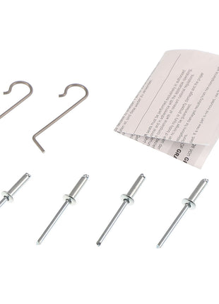 The AGCO Small Parts Kit - F339500030220, consisting of two metal hooks, four metal rivets, and two pieces of folded paper with printed text, is displayed on a white surface.