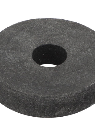 The AGCO Rubber Disc - Fel150248 is a durable black rubber washer with a central hole, typically utilized in plumbing or machinery applications.