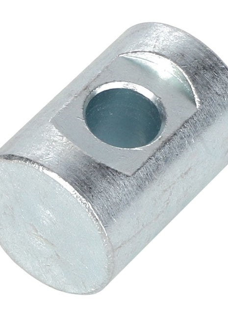 A close-up of the AGCO | PIN - ACP0441870 cylindrical metal piece, featuring a hole through the middle and a flat-edged notch on one side. For more details or inquiries, please contact our support team.