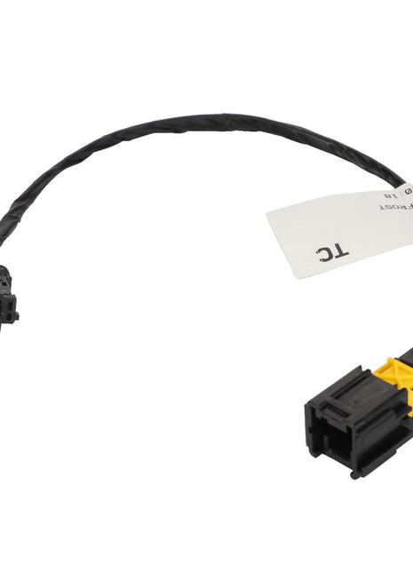 AGCO Harness - Acw1480720 black electrical cable with connectors at both ends and a white label marked "TC." No current product description information available.