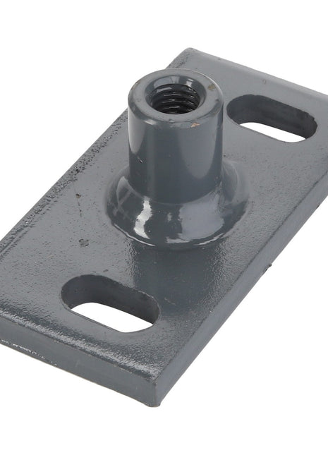 The AGCO | SPRING - D28880502 features a metal rectangular base with rounded corners and two holes at each end. It also includes a central cylindrical threaded extension for fastening. There is no available information regarding its origin.