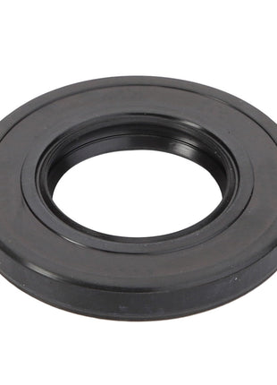 The AGCO Oil Seal - ACY9600770, a black circular rubber seal with a central hole, viewed from above against a plain white background, exemplifies the reliability and performance you expect from genuine AGCO oil seals.