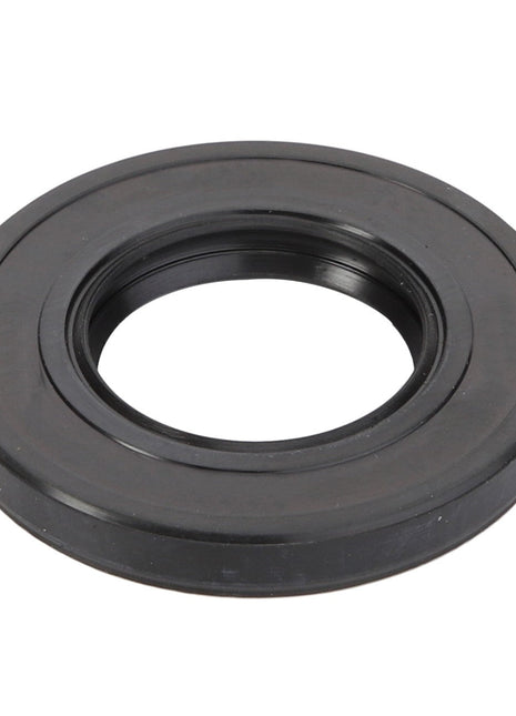 The AGCO Oil Seal - ACY9600770, a black circular rubber seal with a central hole, viewed from above against a plain white background, exemplifies the reliability and performance you expect from genuine AGCO oil seals.