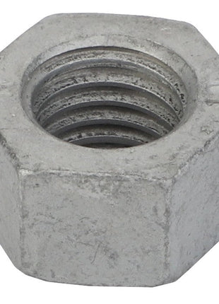 Close-up of an AGCO Hex Nut - Acw0863180, featuring a hexagonal shape with an open threaded hole in the center, designed to be used with a bolt for securing materials. No current product description information available.
