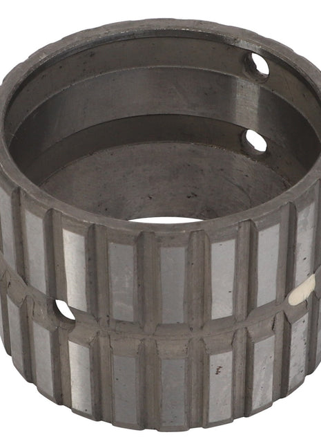 Product Description: The AGCO SLEEVE BUSHING - V30383400 is a metal cylindrical sleeve featuring vertical ridges and circular holes distributed around its circumference. This durable component is manufactured by the reputable brand AGCO.