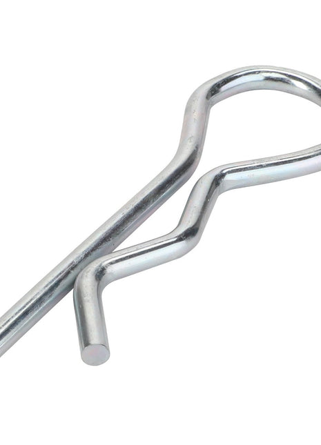 The AGCO | PIN - V30231200, made by AGCO, is a metal R-clip with a bent design that acts as a retaining pin to secure components in place—product description information not provided.