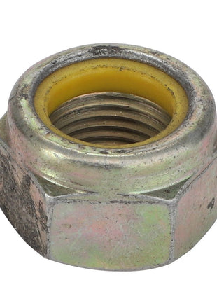 Close-up image of the AGCO Nut - Va022433, a hexagonal metal nut featuring a distinct yellow inner ring.