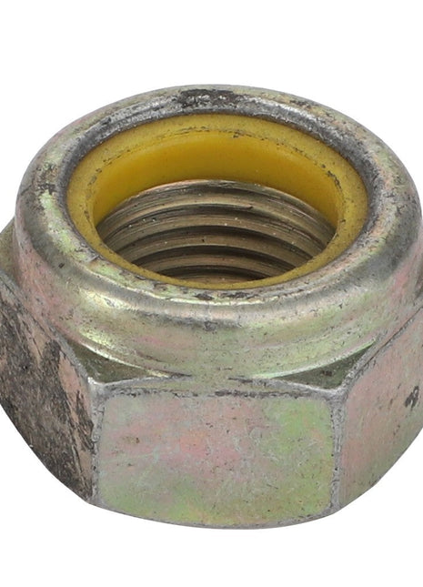 Close-up image of the AGCO Nut - Va022433, a hexagonal metal nut featuring a distinct yellow inner ring.