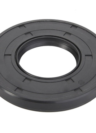 The AGCO Oil Sealing Ring - ACP0279640 is a genuine black rubber oil seal, designed for reliability, featuring a central hole and grooves on one side to enhance performance.