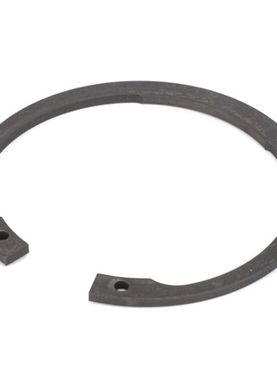 A flat-lying AGCO Lock Washer - Fel108385, with two small holes on either end, on a white background. No current product description available.