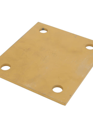 The AGCO spacer, model AG122526, is a square yellow metal plate featuring four evenly spaced circular holes positioned near each corner.