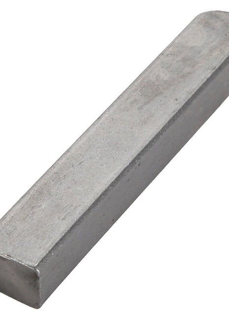 A rectangular metallic bar with a shiny, smooth surface; product description details can be found under AGCO | PARALLEL KEY - ACY9400840 by the brand AGCO.