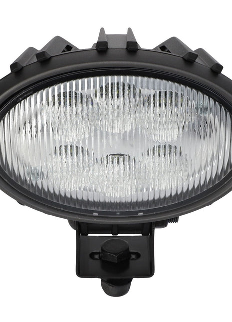 A black, oval-shaped AGCO worklight (model Acw5176070) with a ribbed glass lens and mounting bracket, compatible with various Massey Ferguson models.