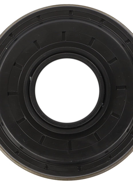 The AGCO | Shaft Sealing Rings - F339300020060 is a black, circular automotive oil seal featuring a central hole encircled by multiple concentric rings. No current product description available.