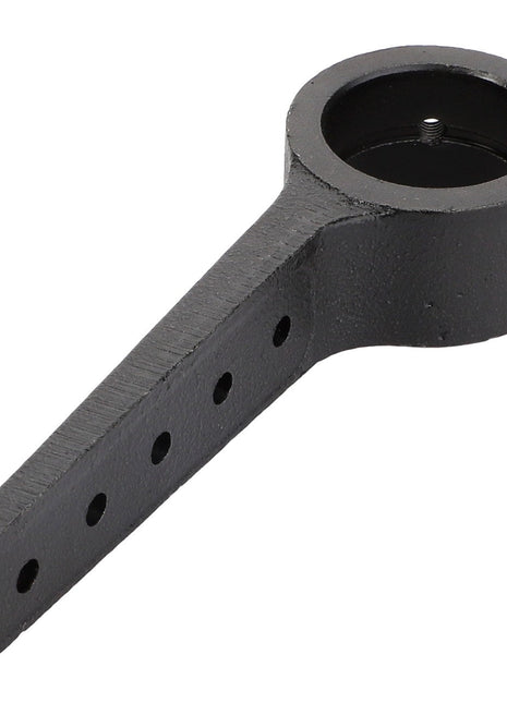 AGCO | KNIFE HEAD - D28260054 is a black metal wrench with a cylindrical end and four holes in the handle—no product description needed.
