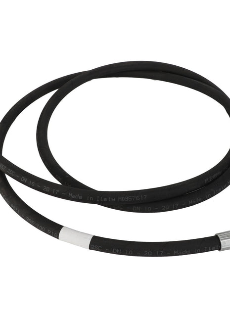 An AGCO HOSE - AL9032531, a black industrial hydraulic hose with metal fittings on both ends, expertly coiled in a circular shape.