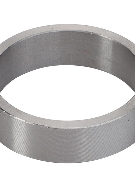 A plain, cylindrical metal ring viewed at a slight angle against a white background, identified as AGCO Spacer Tube - Fel140067 by the brand AGCO.