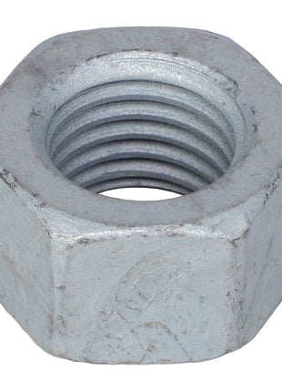 A close-up view of an AGCO | HEX NUT - CH8T-4001 reveals intricate internal threading.