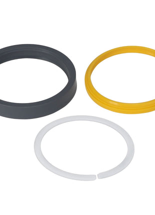 Experience the AGCO Seals Kit - Acp0357040, featuring three vibrant sealing rings in different colors: a sleek black ring, a sunny yellow ring, and a crisp white ring with a small opening.